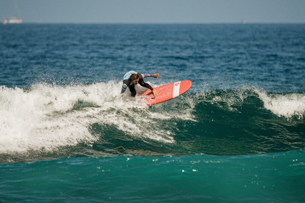 Blackstone Surf Center instructor surfing in Playa las Américas in Tenerife