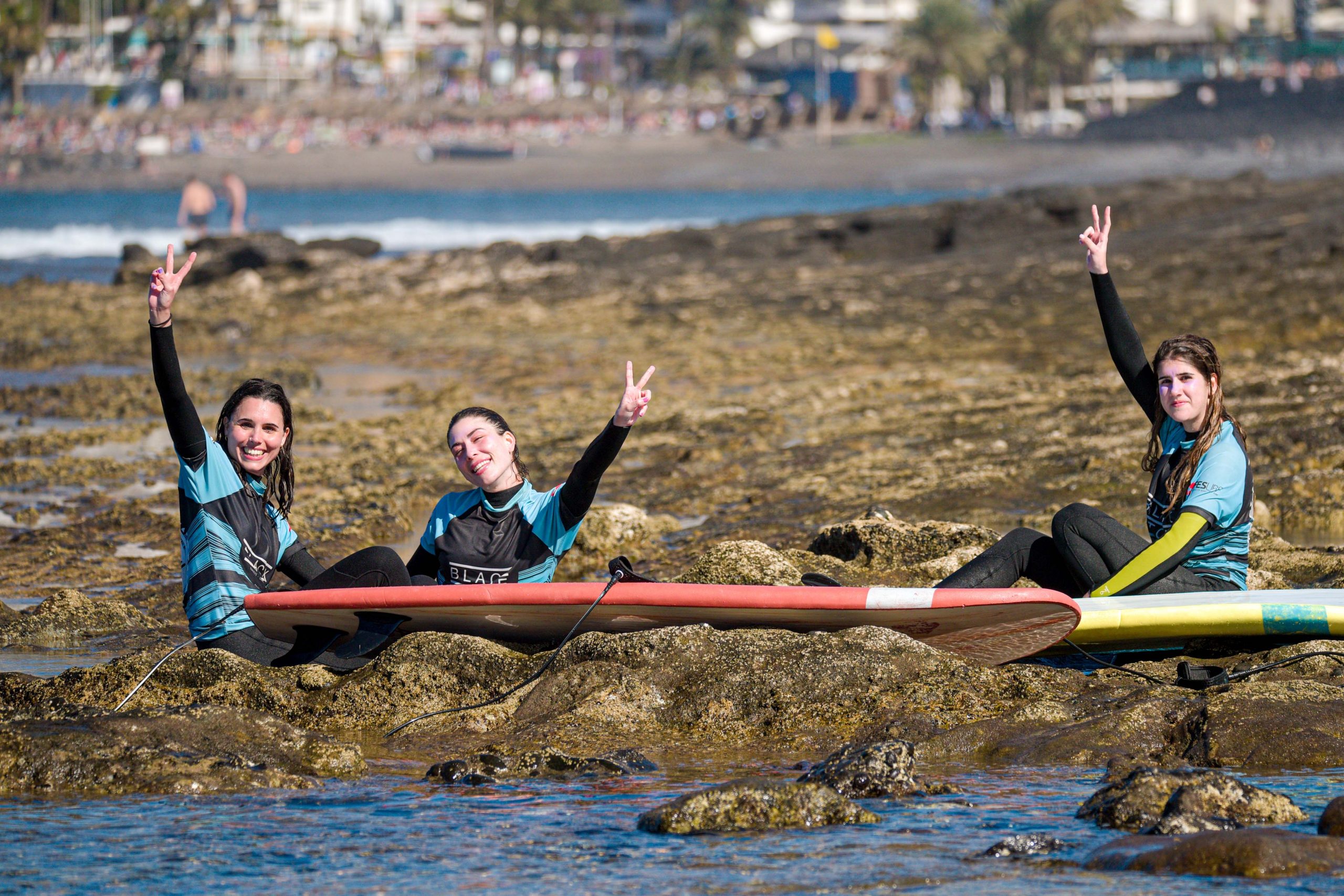 Blackstone Surf Center students in Playa las Américas in Tenerife after a surf lesson